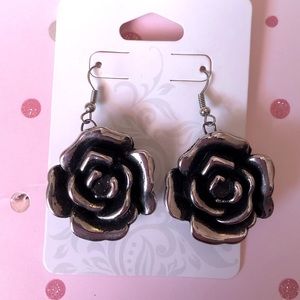 Silver roses very light and do night weight on your earlobes at all
